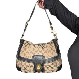 Vintage coach brown and black Legacy bag.